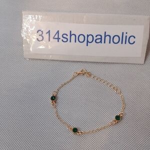 Gold Bracelet With Green Accents